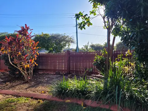 The red brown fence from the garden side