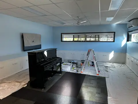 Music room mid job, ladder and drop sheets out